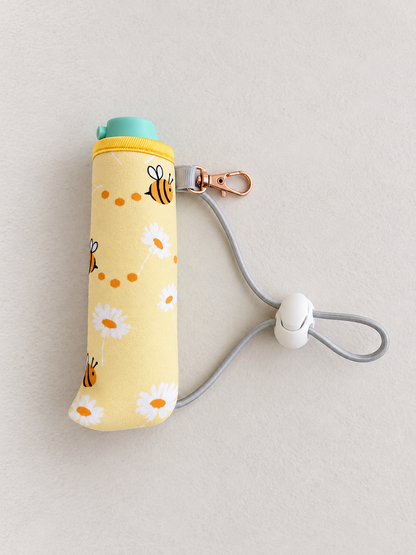 Bonobo baby bidet in Bumble Bee print with elastic cord and cord lock
