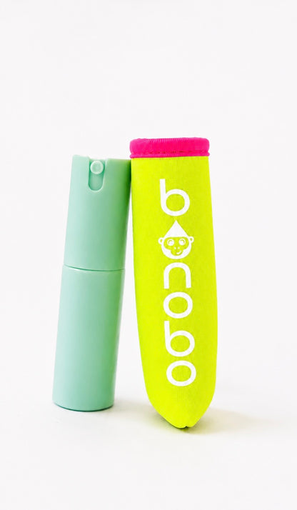 Neon Vibes Bonobo Baby Bidet Variant.  Neon neoprene pouch next to mint green portable spray bottle 