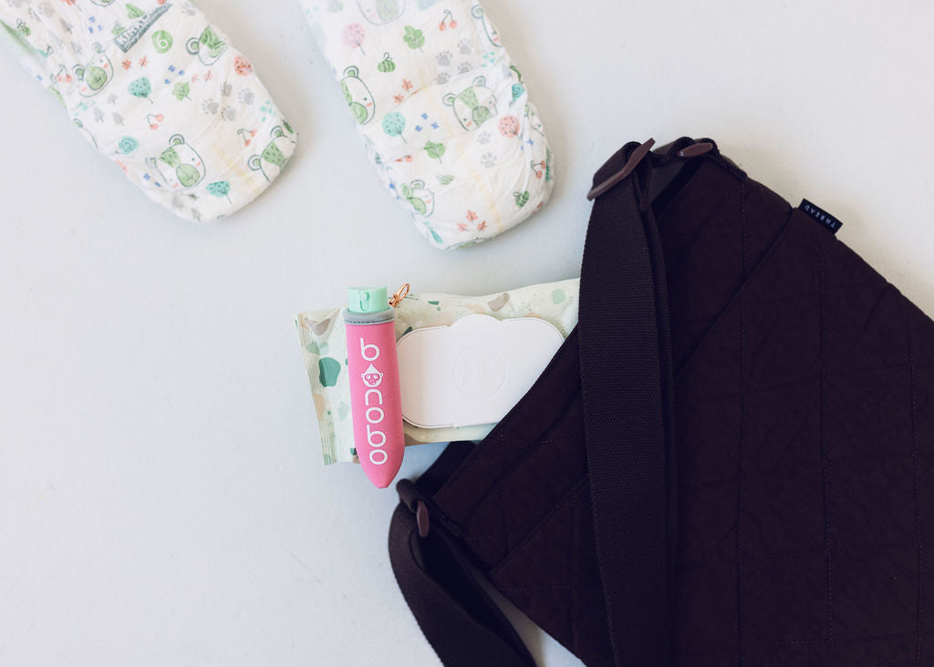 Three-pack laid flat showing color variations and the soft neoprene pouch edges, emphasizing durable, water-resistant construction.