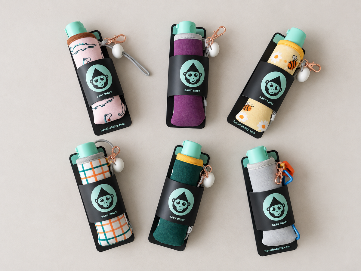 Six Bonobo baby bidet pouches in different colors and prints