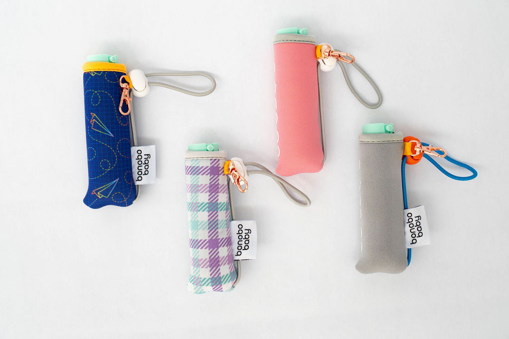 Bonobo Duo wipes pouch flat lay, showing elastic band that secures to standard wipe packs.